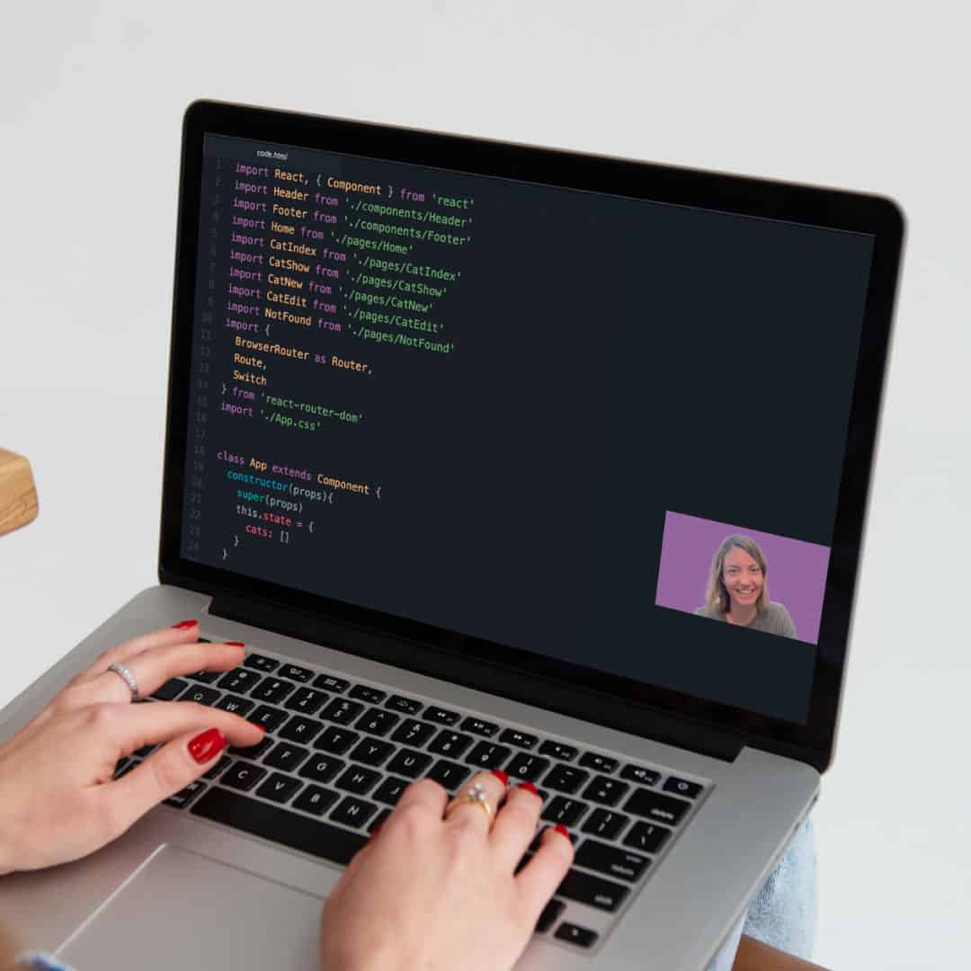 Female coder getting help from coding bootcamp instructor